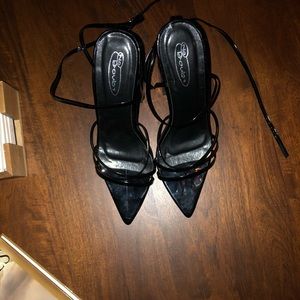 Strappy pointed block heel sandals.